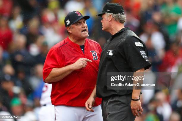 Manager John Farrell of the Boston Red Sox argues with first base umpire Mike Everitt after being ejected by home plate umpire Mark Wegner in the...