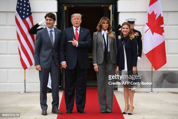 President Donald Trump and First Lady Melania Trump welcome Canadian Prime Minister Justin Trudeau and his wife Sophie Gregoire Trudeau at the White...