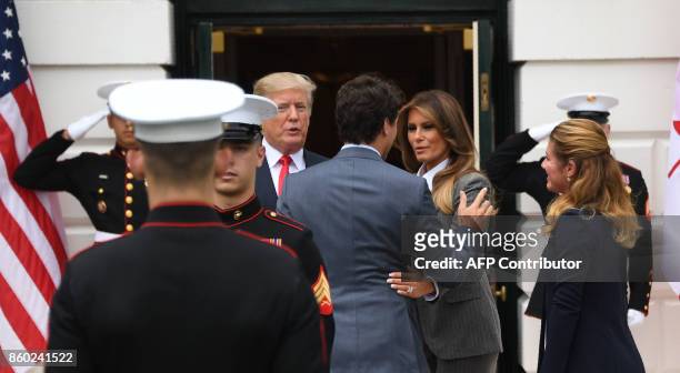 President Donald Trump and First Lady Melania Trump welcome Canadian Prime Minister Justin Trudeau and his wife Sophie Gregoire Trudeau at the White...