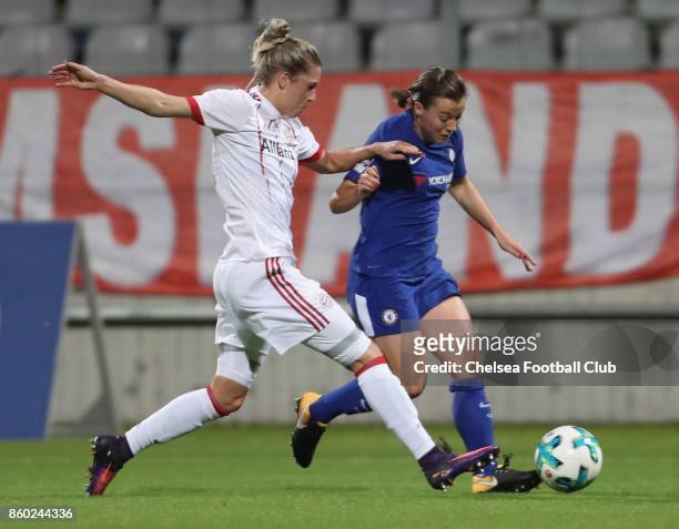 Verena Faisst of FC Bayern Muenchen fights for the ball with Francesca Kirby of Chelsea FC during the Champions League round of 32 second leg match...