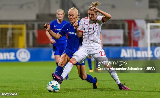 Maria Thorisdottir of Chelsea in action against Verena Faisst of Bayer Muenchen during the UEFA Women Champions League Round of 32 second leg match...