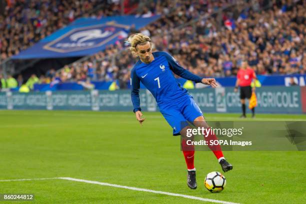 Antoine Griezmann in action during the World Cup Group A qualifying soccer match between France and Belarus at Stade de France. .