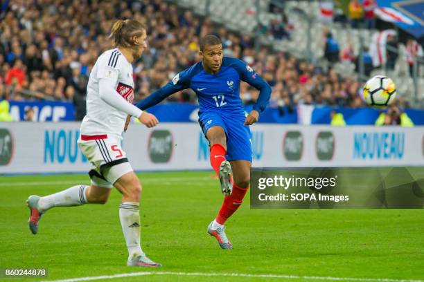 Kylian Mbappe in action during the World Cup Group A qualifying soccer match between France and Belarus at Stade de France. .