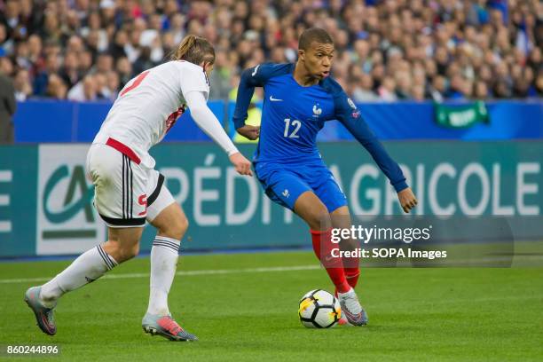 Kylian Mbappe in action during the World Cup Group A qualifying soccer match between France and Belarus at Stade de France. .