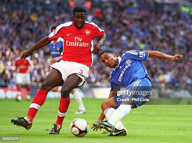 Florent Malouda of Chelsea is closed down by Kolo Toure of Arsenal during the FA Cup sponsored by E.ON Semi Final match between Arsenal and Chelsea...
