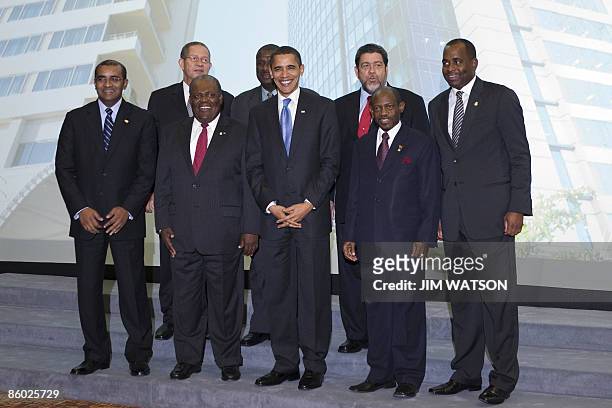 President Barack Obama poses with CARICOM leaders during the 5th Summit of the Americas at the Hyatt Regency in Port of Spain, Trinidad April 18,...