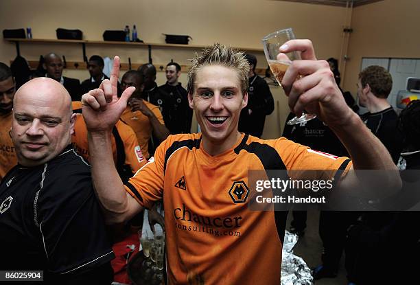 In this handout photo provided by Wolverhampton Wanderers Football Club, Wolverhampton Wanderers David Edwards celebrates with his team mates in the...