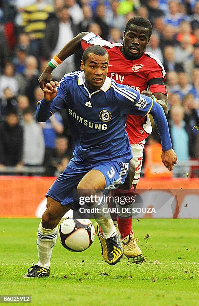 Arsenal's Ivorian defender Kolo Toure vies with Chelsea's Ashley Cole during the FA Cup Semi-Final football match at Wembley Stadium in London on...