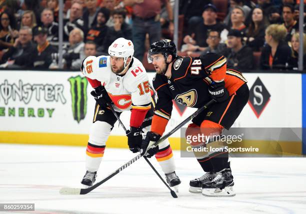 Calgary Flames Left Wing Tanner Glass and Anaheim Ducks Winger Logan Shaw set up for a face off during an NHL game between the Calgary Flames and the...