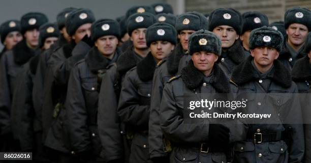 Russian police watch the Russian Football League Championship match between Spartak Moscow and Terek Grozny at the Luzhniki Stadium on April 18, 2009...