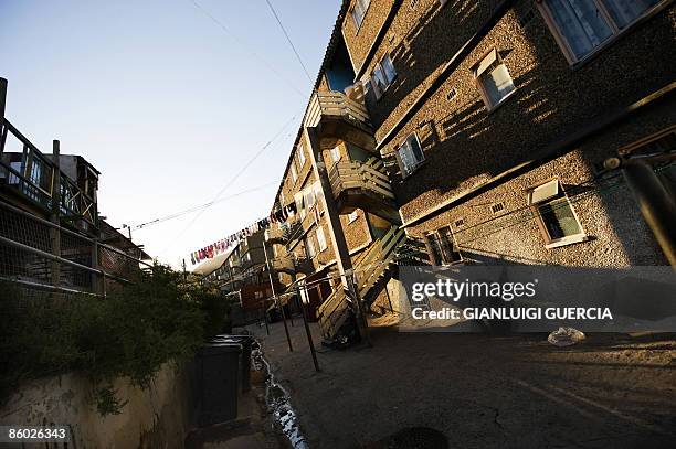 General view of flats and shacks is seen on April 15, 2009 in Hout Bay ont the outskirt of Cape Town, South Africa. Rising property prices are one of...