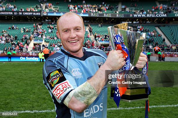 Man of the Match Martyn Williams of Cardiff poses with the trophy following his team's victory during the EDF Energy Cup Final between Gloucester and...