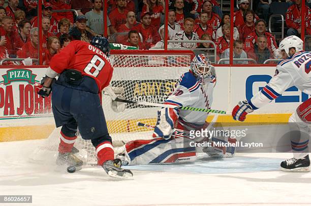 Henrik Lundqvist of the New York Rangers makes a save during Game Two of the Eastern Conference Quarterfinals of the 2009 NHL Stanley Cup Playoffs...