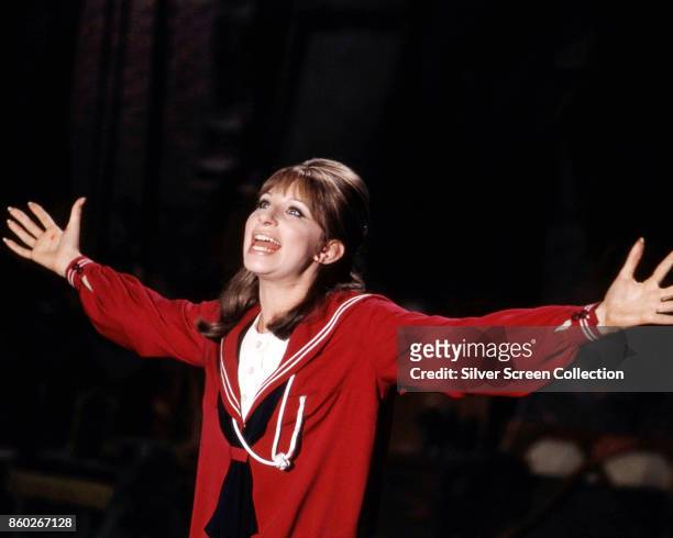 American actress and singer Barbra Streisand sings in a scene from 'Funny Girl' , 1968.