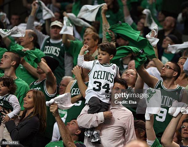 The Boston Celtics fans try to rally their team in the second half against the Chicago Bulls in Game One of the Eastern Conference Quarterfinals...