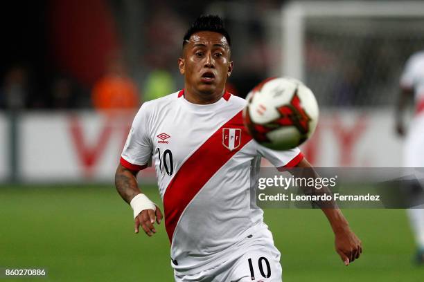 Christian Cueva of Peru looks at the ball during a match between Peru and Colombia as part of FIFA 2018 World Cup Qualifiers at National Stadium on...