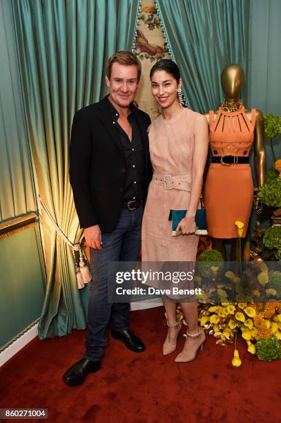 William Banks-Blaney and Caroline Issa attend the William Vintage x Farfetch Gianni Versace archive launch dinner at The Dorchester on October 11,...