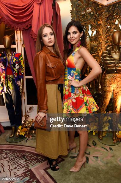 Xenia Tchoumi and Doina Ciobanu attend the William Vintage x Farfetch Gianni Versace archive launch dinner at The Dorchester on October 11, 2017 in...