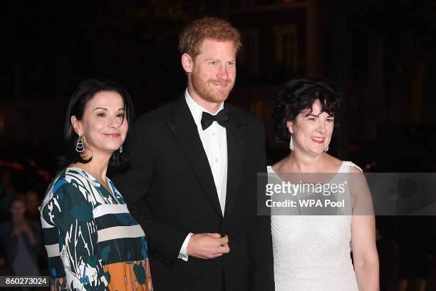 Prince Harry with Amanda Pullinger, Chief Executive Officer of 100 Women in Finance and Sonia Gardner attend 100 Women in Finance Gala Dinner in aid...