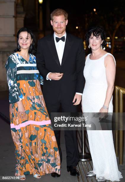 Prince Harry with Sonia Gardner , President of 100 Women in Finance and Amanda Pullinger , Director of 100 Women in Finance arrive for the 100 Women...