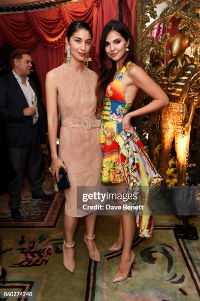 Caroline Issa and Doina Ciobanu attend the William Vintage x Farfetch Gianni Versace archive launch dinner at The Dorchester on October 11, 2017 in...