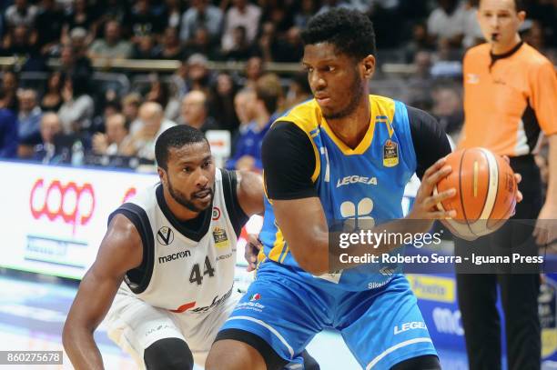 Damien Inglis of Betaland competes with Marcus Slaughter of Segafredo during the LBA LegaBasket of Serie A1 match between Virtus Segafredo Bologna...