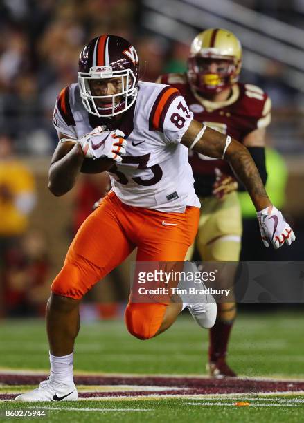 Eric Kumah of the Virginia Tech Hokies runs with the ball against the Boston College Eagles at Alumni Stadium on October 7, 2017 in Chestnut Hill,...