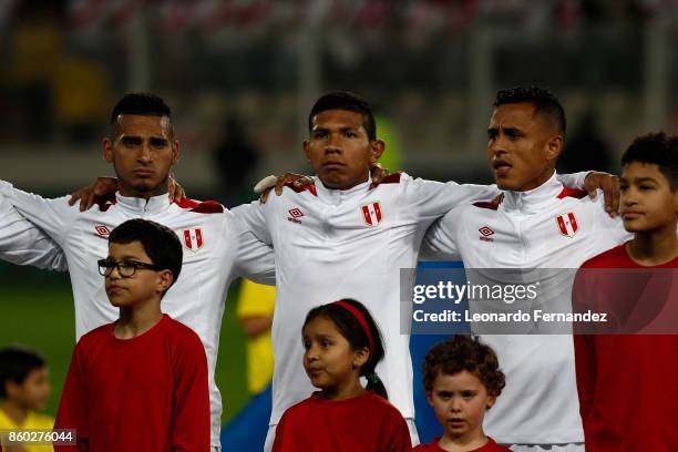 Miguel Trauco, Edison Flores and Yoshimar Yotun of Peru line up before the match between Peru and Colombia as part of FIFA 2018 World Cup Qualifiers...