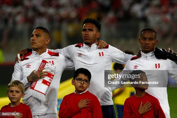 Paolo Guerrero, Pedro Gallese and Andre Carrillo of Peru line up before the match between Peru and Colombia as part of FIFA 2018 World Cup Qualifiers...