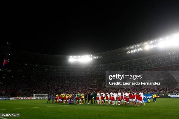 Players of Peru and Colombia line up before the match between Peru and Colombia as part of FIFA 2018 World Cup Qualifiers at National Stadium on...