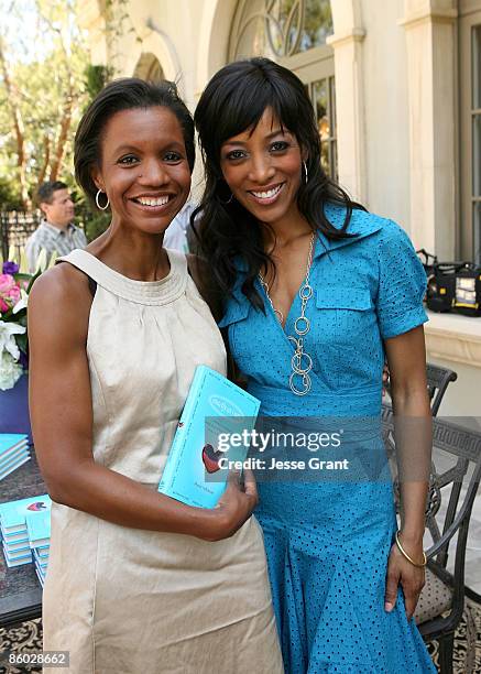 Salaam Coleman Smith and Shaun Robinson attend a reception celebrating the release of Shaun Robinson's book "Exactly As I Am" at a private residence...