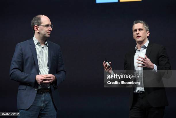 Aaron Levie, chief executive officer and co-founder of Box Inc., right, speaks as Scott Guthrie, executive vice president of cloud and enterprise at...