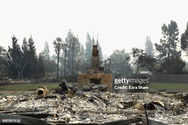 Homes are left completely destroyed by the Tubbs Fire on October 11, 2017 in Kenwood, California. In one of the worst wildfires in state history,...