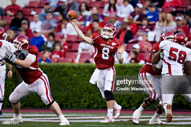 Tyler Wilson#8 of the Arkansas Razorbacks Red team throws a pass during the Spring Red White game at Donald W. Reynolds Stadium on April 18, 2009 in...