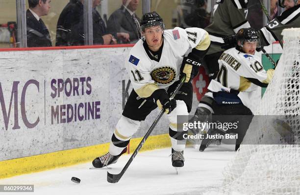 Monte Graham of the Muskegon Lumberjacks skates with the puck during the game against the Tri-City Storm on Day 3 of the USHL Fall Classic at UPMC...