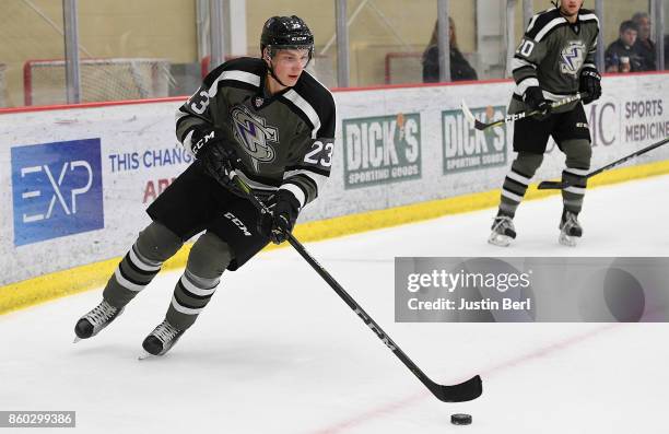 Hugo Blixt of the Tri-City Storm skates with the puck during the game against the Muskegon Lumberjacks on Day 3 of the USHL Fall Classic at UPMC...