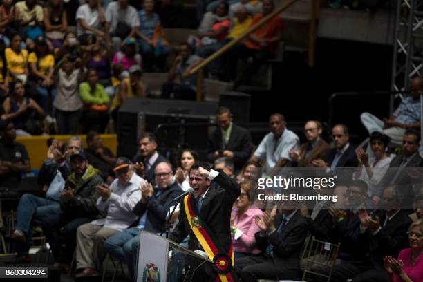 Henrique Capriles, opposition leader and governor of the State of Miranda, speaks during an event marking his last day as governor in Caracas,...