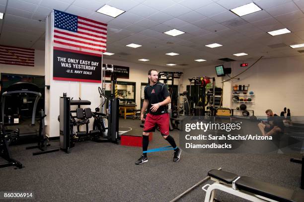 Adam Rosales of the Arizona Diamondbacks works out the day before game three of the National League Division Series between the Los Angeles Dodgers...