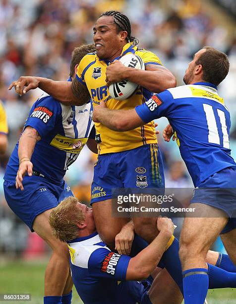 Fuifui Moimoi of the Eels is tackled during the round six NRL match between the Parramatta Eels and the Bulldogs at ANZ Stadium on April 19, 2009 in...