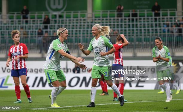 Nilla Fischer and Pernille Harder of Wolfsburg celebrate after scoring during the UEFA Women Champions League Round of 32 second leg match between...