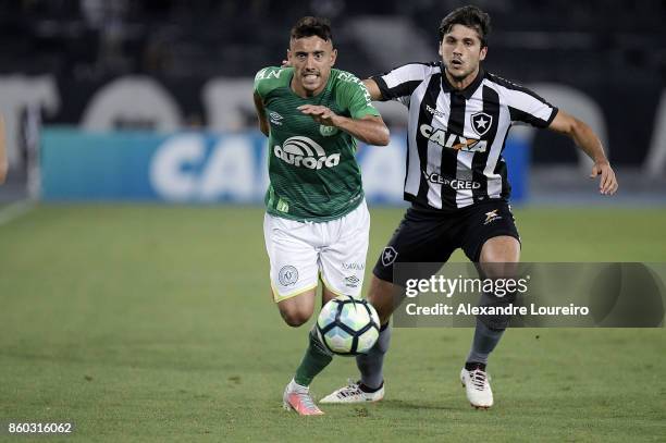 Igor Rabello of Botafogo battles for the ball with Alan Ruschel of Chapecoense during the match between Botafogo and Chapecoense as part of...