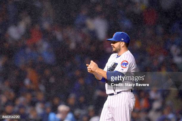 Brian Duensing of the Chicago Cubs stands on the mound in the eighth inning during game four of the National League Division Series against the...