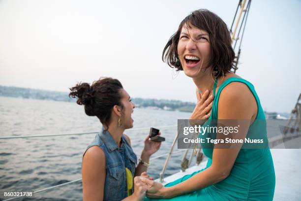 lesbian engagement - sailing couple stock pictures, royalty-free photos & images