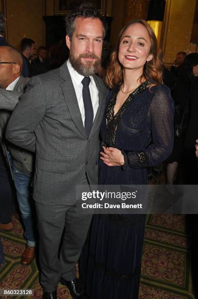 John Light and Lydia Leonard attend the press night after party for "Oslo" at The Royal Horseguards on October 11, 2017 in London, England.