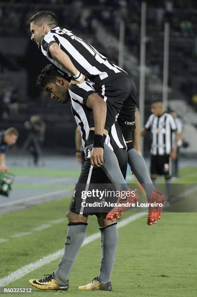 Brenner of Botafogo celebrates a scored goal with Rodrigo Pimpao during the match between Botafogo and Chapecoense as part of Brasileirao Series A...
