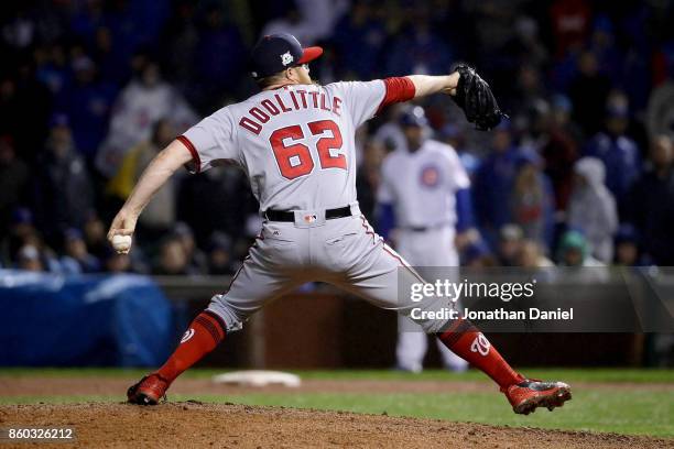 Sean Doolittle of the Washington Nationals pitches in the ninth inning during game four of the National League Division Series against the Chicago...