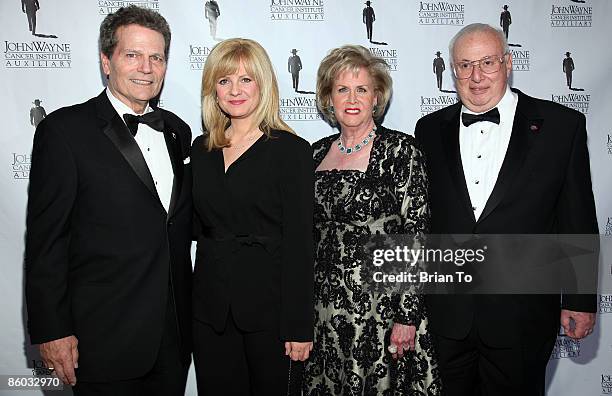 Chairman Patrick Wayne , actress Bonnie Hunt, Donna Rosen and Harvey Rosen arrive at the 24th Annual Odyssey Ball at the Beverly Hilton Hotel on...