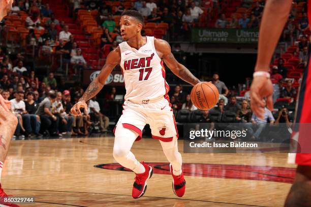 Rodney McGruder of the Miami Heat handles the ball during a preseason game against the Washington Wizards at the American Airlines Arena on October...