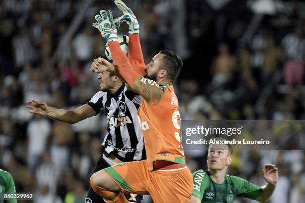 Igor Rabello of Botafogo battles for the ball with Jandrei of Chapecoense during the match between Botafogo and Chapecoense as part of Brasileirao...