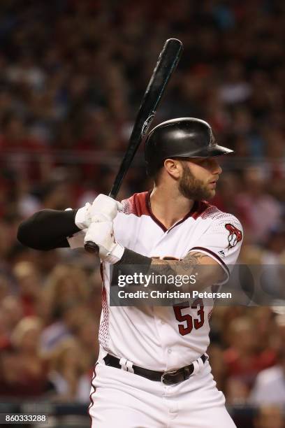 Christian Walker of the Arizona Diamondbacks bats against the Los Angeles Dodgers during the National League Divisional Series game three at Chase...